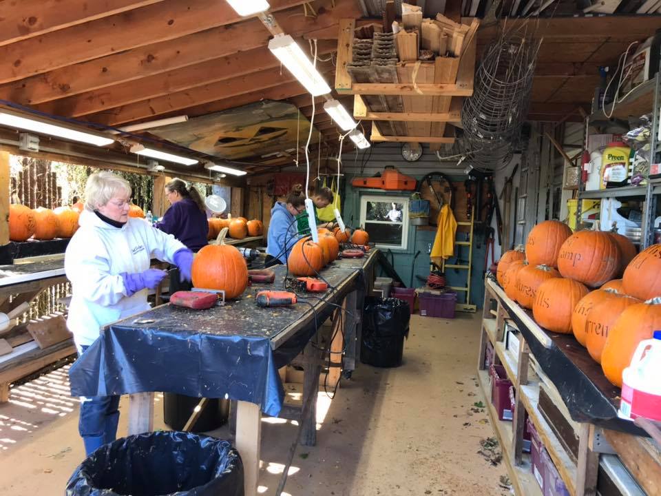 Spectacular evening display of thousands of lit pumpkins at the Pumpkin House
